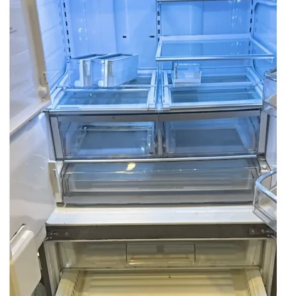 Sparkling clean refrigerator interior after cleaning